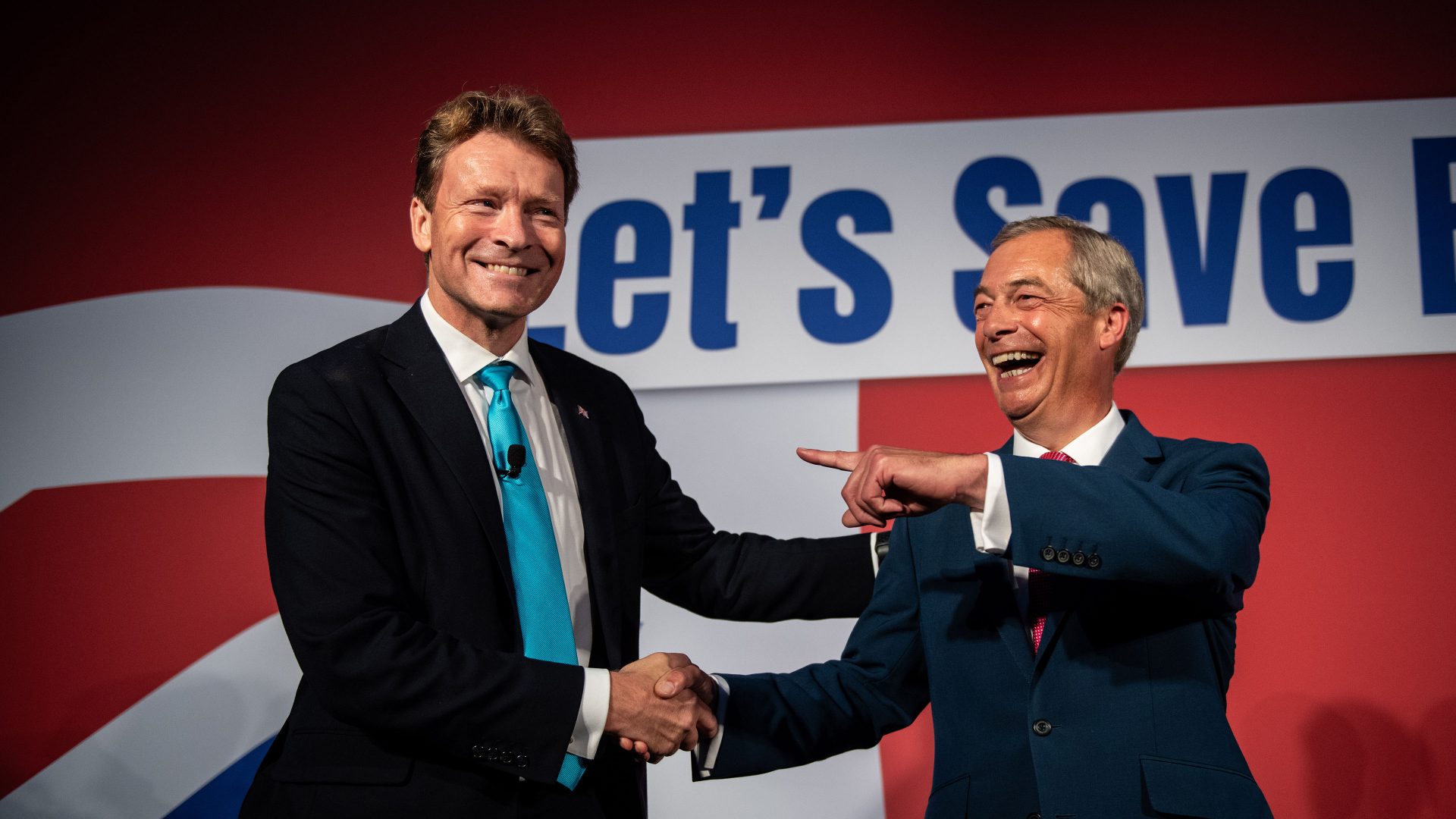 Caption: Richard Tice, Reform Party leader (left) and Nigel Farage on stage at the Reform Party annual conference in October 2023. Photo: Chris J Ratcliffe/Getty