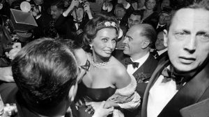 Sophia Loren and her husband Carlo Ponti, surrounded by photographers at the 1958 Cannes Film Festival. Photo: ullstein bild/Getty