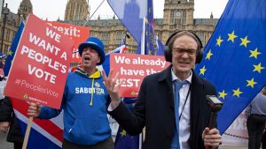 BBC reporter Chris Mason tries to make himself heard over anti-Brexit demonstrators in Westminster, 2018. Photo: Mike Kemp/In Pictures/Getty