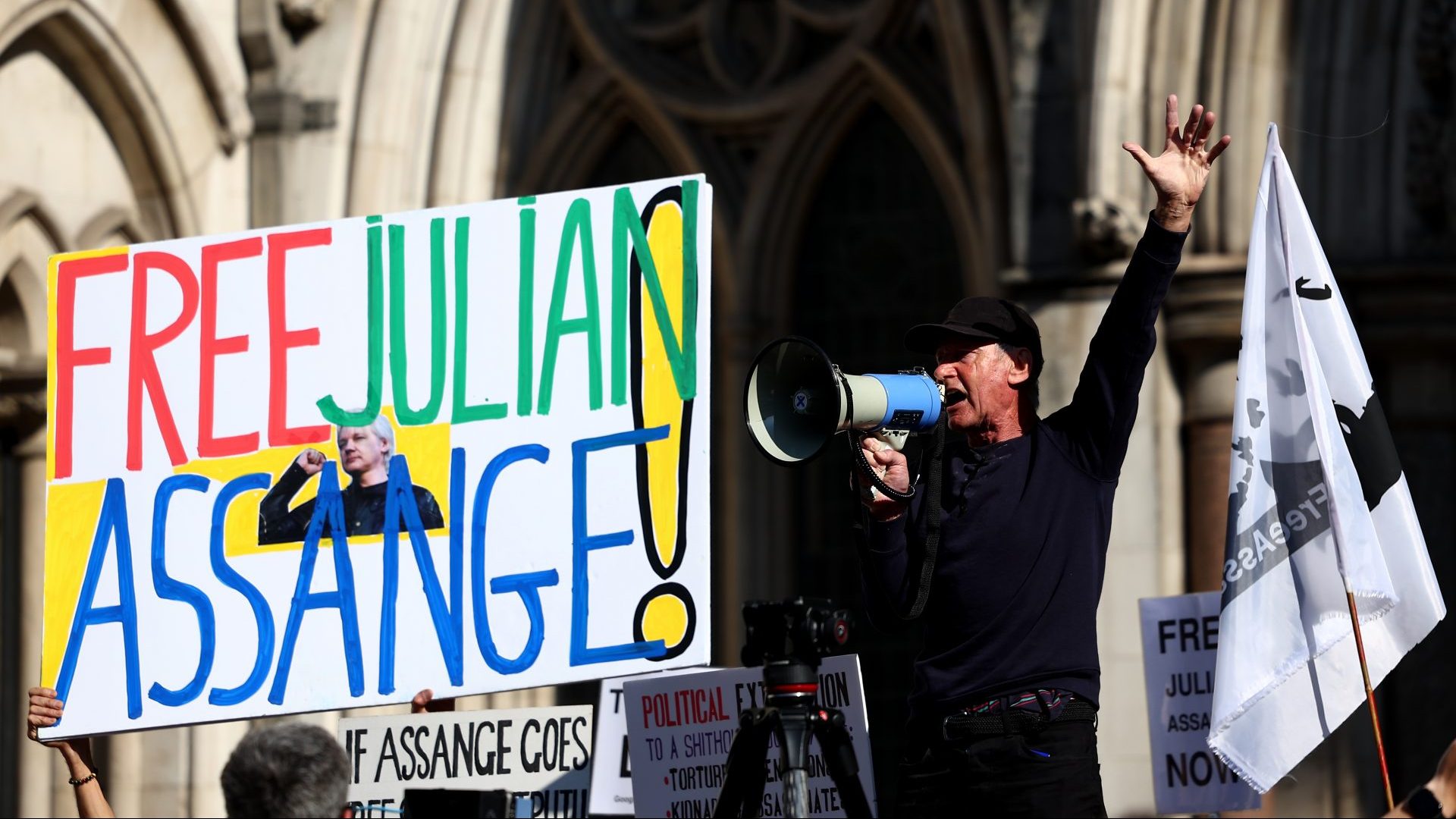 Supporters of Julian Assange gather as they wait for the outcome of Assange's appeal against extradition to the U.S. outside the Royal Courts of Justice on May 20, 2024 (Photo by Peter Nicholls/Getty Images)