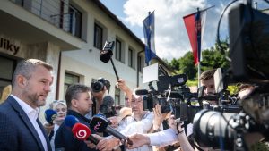 Slovakia's President-elect Peter Pellegrini talks with journalists in front of a polling station. Photo: VLADIMIR SIMICEK/AFP via Getty Images