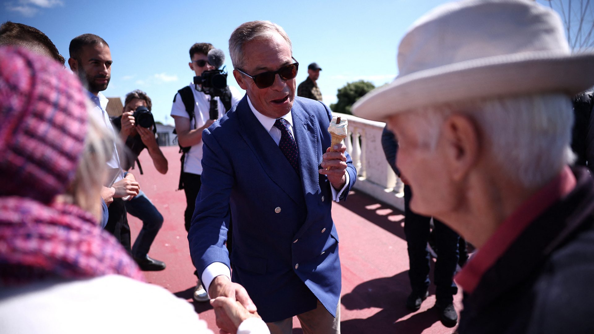Reform UK leader Nigel Farage meets residents in Clacton-on-Sea on July 4, 2024 as Britain goes to the polls. Photo: Henry Nicholls/AFP/Getty