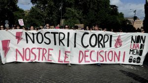 People from the trans feminist movement Non Una di Meno, with a banner that reads: ‘Our bodies, our decisions’, protest against the government in Rome. Photo: Simona Granati/Corbis/Getty