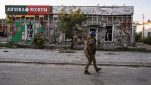 A Ukrainian soldier walks through the Russian town of Sudzha on August 16, 2024. Photo: Taras Ibragimov/Suspilne Ukraine/Getty