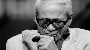 Belgian jazz musician Toots Thielemans performs at the North Sea Jazz Festival in The Hague, 1993. Photo: Frans Schellekens/Redferns/Getty