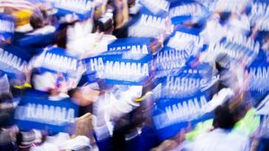 Delegates show their support as Kamala Harris delivers her acceptance speech in Chicago on August 22. Photo: Bill Clark/CQ-Roll Call/Getty