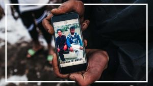 A migrant shows a photo on his phone in Bihac, Bosnia and Herzegovina on December 23, 2022. Photo: Borja Abargues/Anadolu Agency via Getty Images