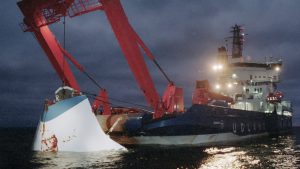 The bow door of the MS Estonia is lifted from the seabed in November 1994, nearly two months after the ferry sank in the Baltic Sea. Photo: Jaakko Avikainen/Lehtikuva/AFP/Getty