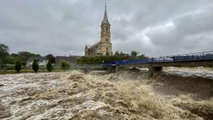 A torrent of water flows along the River Bělá during heavy rain on September 14 in Mikulovice, Czech Republic. Photo: Gabriel Kuchta/Getty