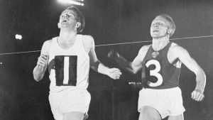 Chris Chataway, left, beats Vladimir Kuts in the 5,000m event held at White City in 1954, televised via the Eurovision network. Photo: Bettmann/Getty