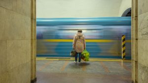 A passenger waits for a train at Arsenalna station on the Kyiv Metro, as life in the city goes on largely as normal, despite the war with Russia. Photo: Artem Gvozdkov/Global Images Ukraine/Getty