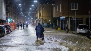 The waters of the Ravone flood streets in the Porto Saragozza neighbourhood of Bologna. Photo: Massimiliano Donati/Getty