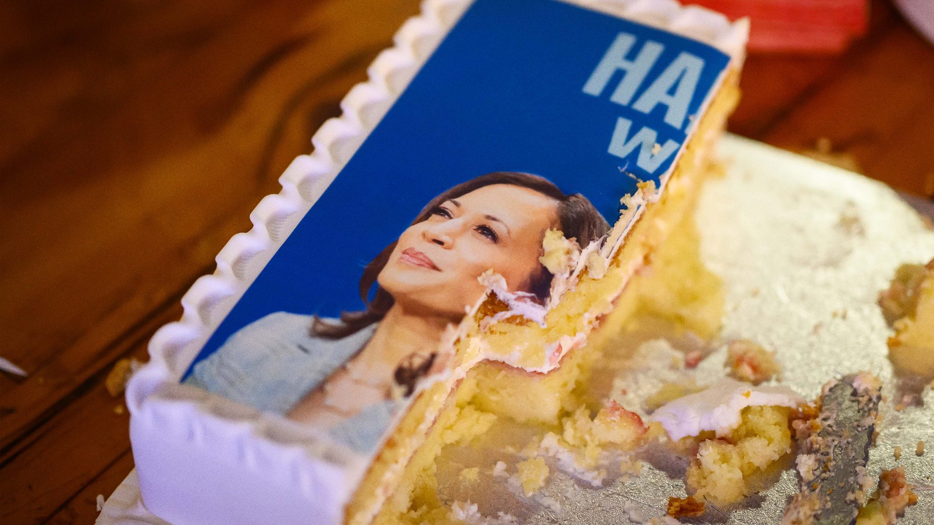 The remains of a cake featuring a photograph of Democratic presidential nominee, U.S. Vice President Kamala Harris, is seen at a "Democrats Abroad" election party. Photo: Leon Neal/Getty Images