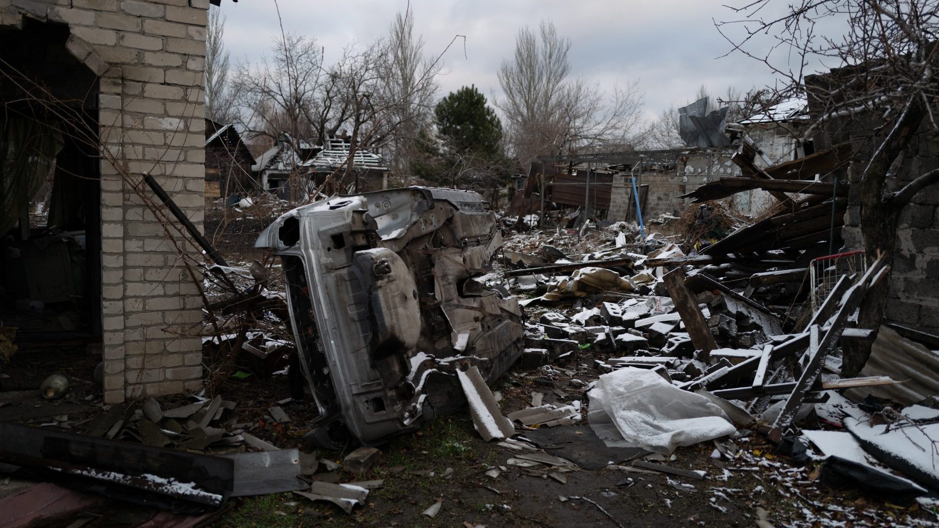 a destroyed car and rubble from a recent shelling in Pokrovsk, Donetsk region. Photo: FLORENT VERGNES/AFP via Getty Images