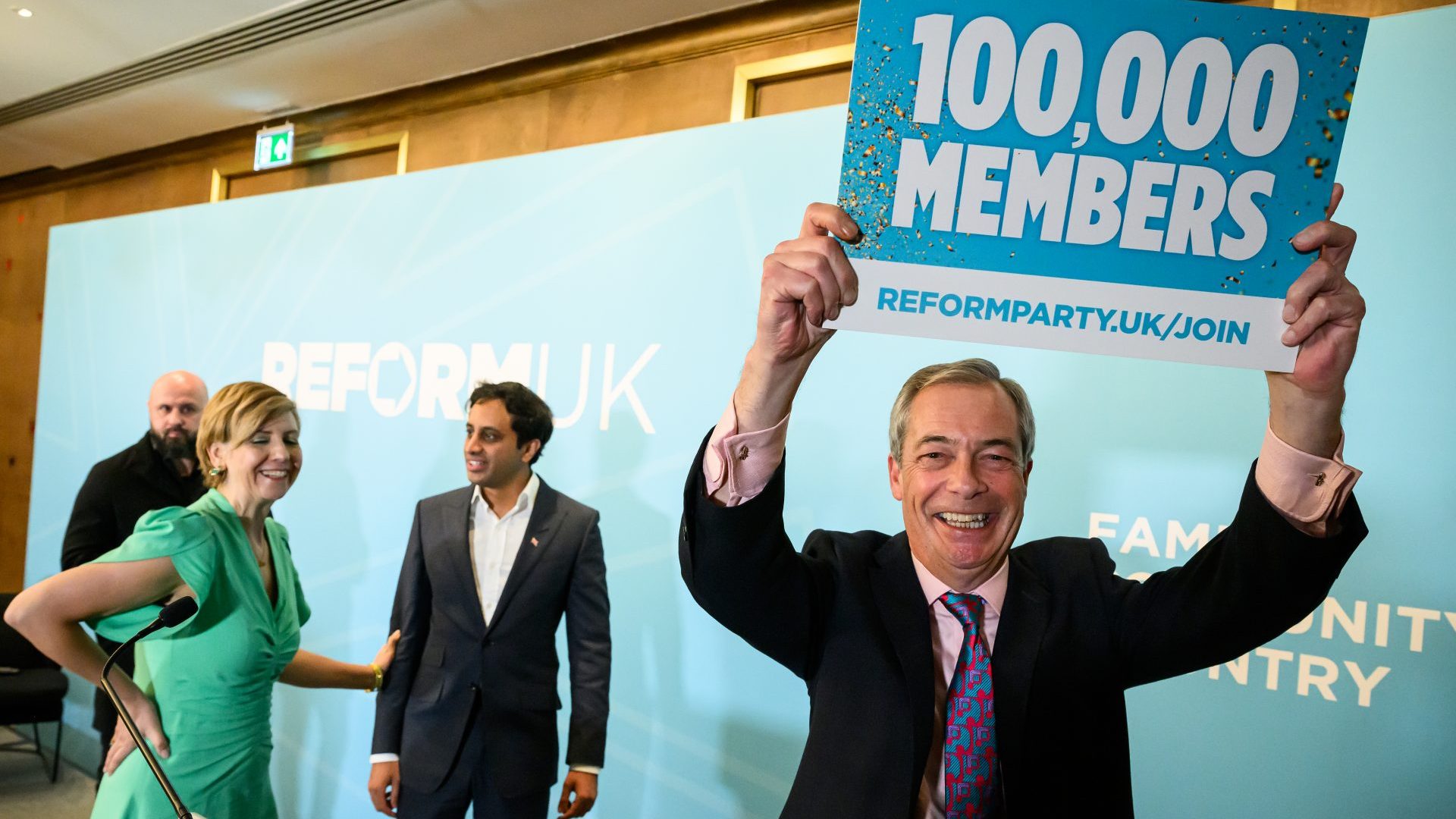 Nigel Farage celebrates Andrea Jenkyns' defection to Reform (Photo by Leon Neal/Getty Images)