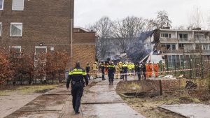 Police, firefighters, canine units, and first responders on the scene at the Tarwerkamp residential area in The Hague following a bomb blast. Photo: Charles M Vella/SOPA Images/LightRocket via Getty Images