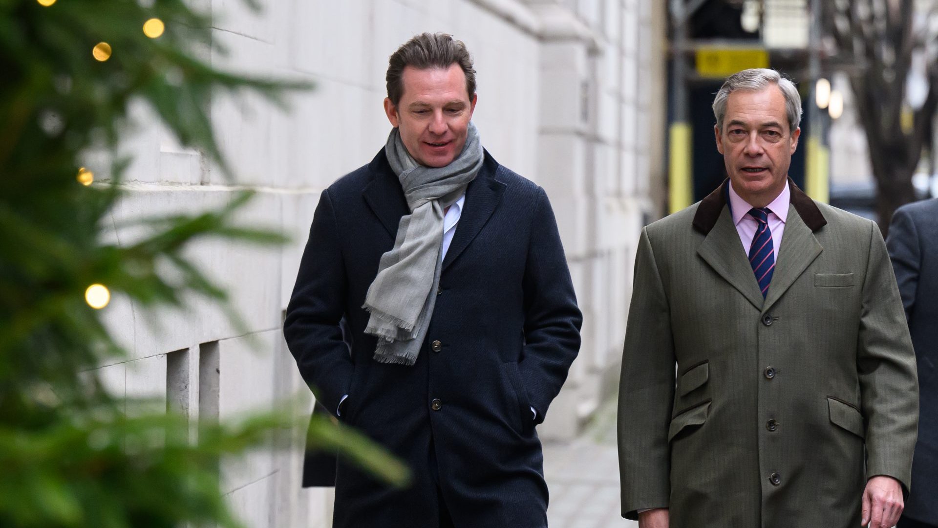 Nigel Farage walks with Billionaire Nick Candy before he is announced as the party treasurer. Photo: Leon Neal/Getty Images 