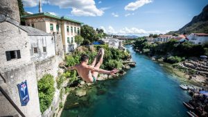 A man dives from the 21-metre Stari Most (Old Bridge) in Mostar, Bosnia and Herzegovina. Photo: Romina Amato/Red Bull/Getty