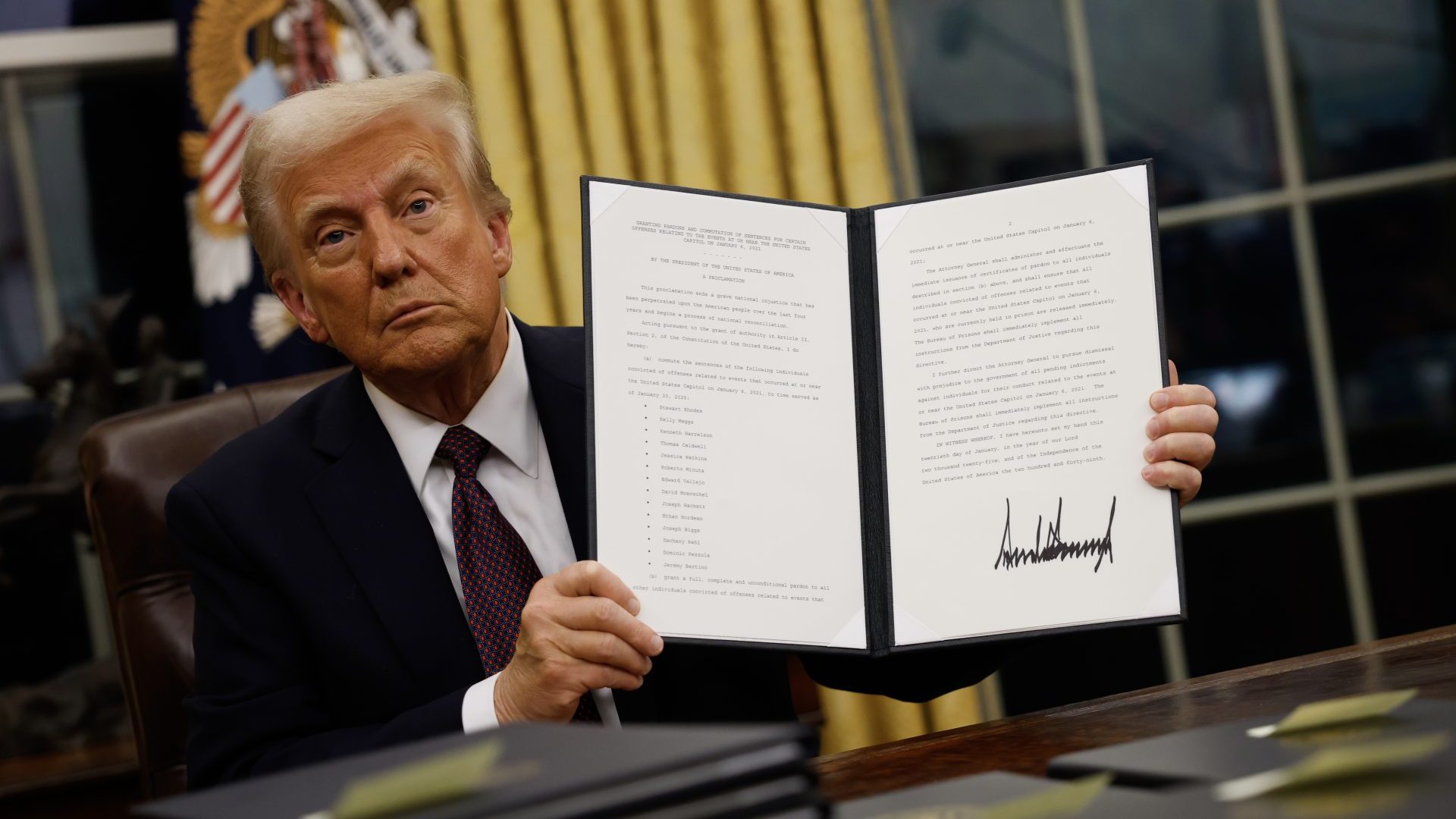 President Donald Trump signs executive orders in the Oval Office. Photo: Anna Moneymaker/Getty Images