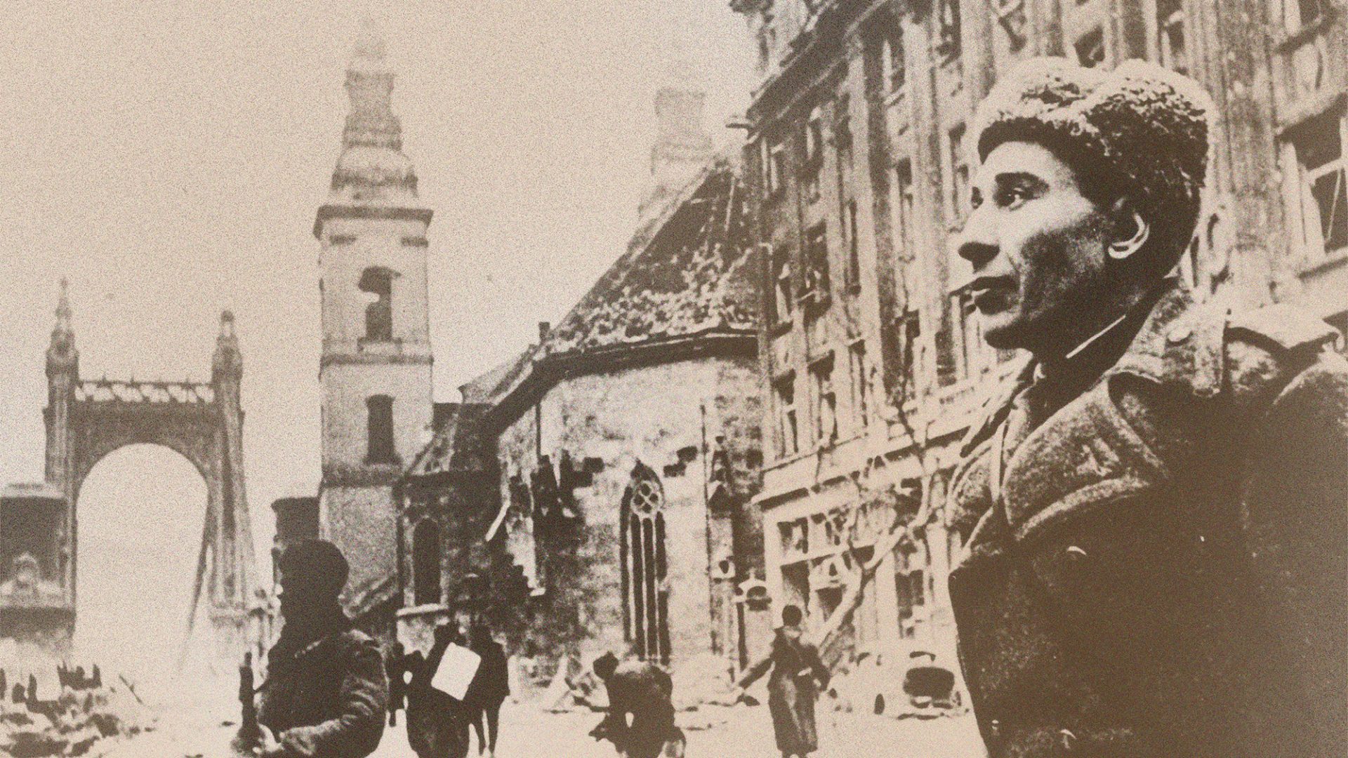 January 1945: A soldier stands in the snow by the damaged Inner City Church and the Elizabeth Church in Budapest in the last few months of WW II. Photo: Keystone/Getty Images