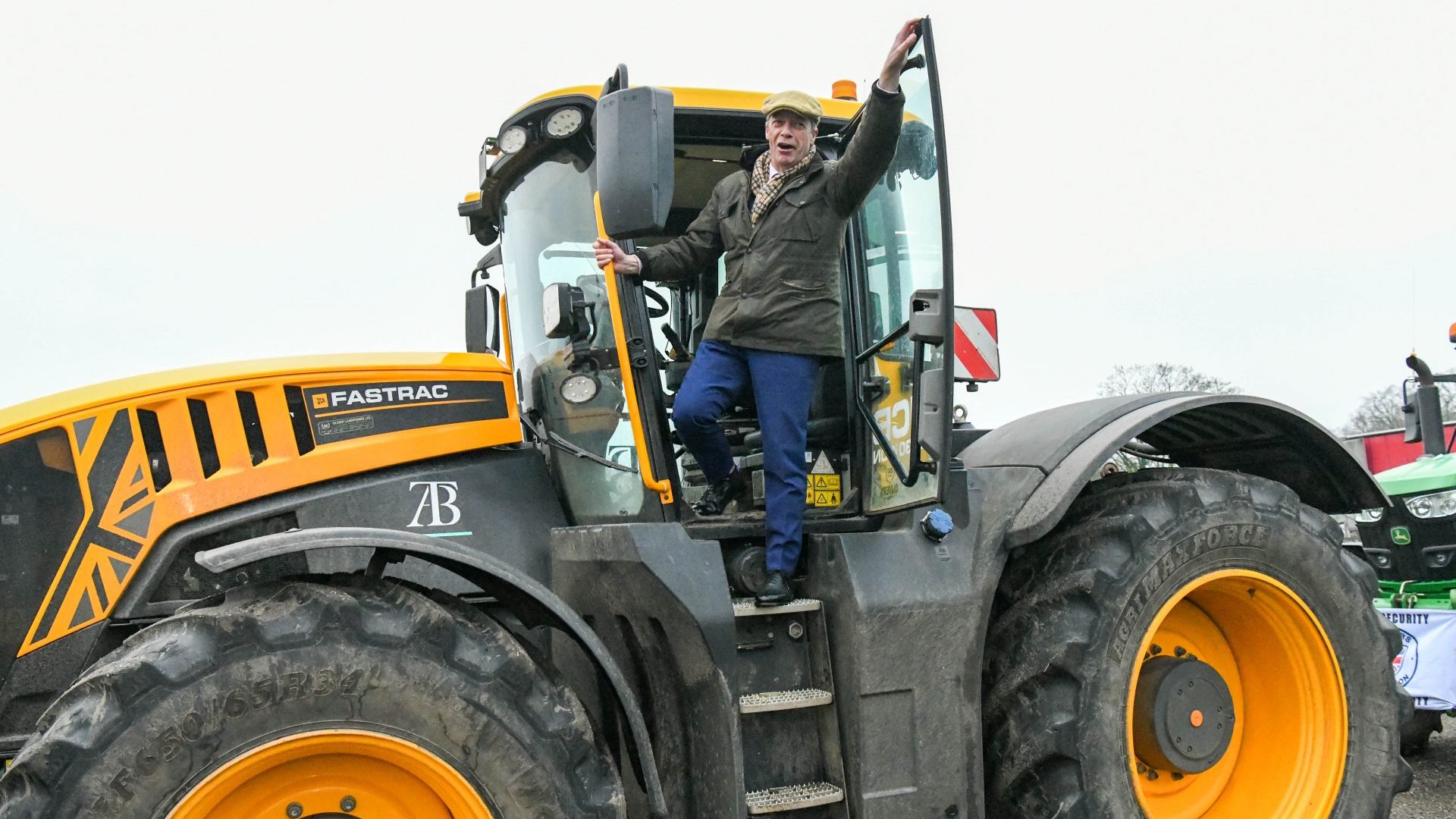 Nigel Farage stands on a tractor as he attends a farmers demonstration against proposed changes to inheritance tax rules. Photo: Antony Jones/Getty Images