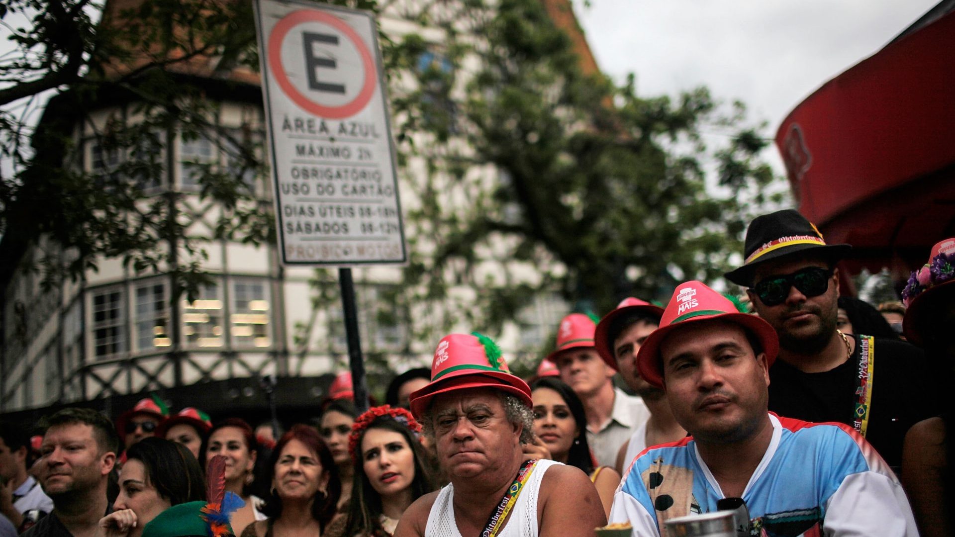 Revellers gather to watch an Oktoberfest parade in Blumenau, Brazil. Photo: Mario Tama/Getty