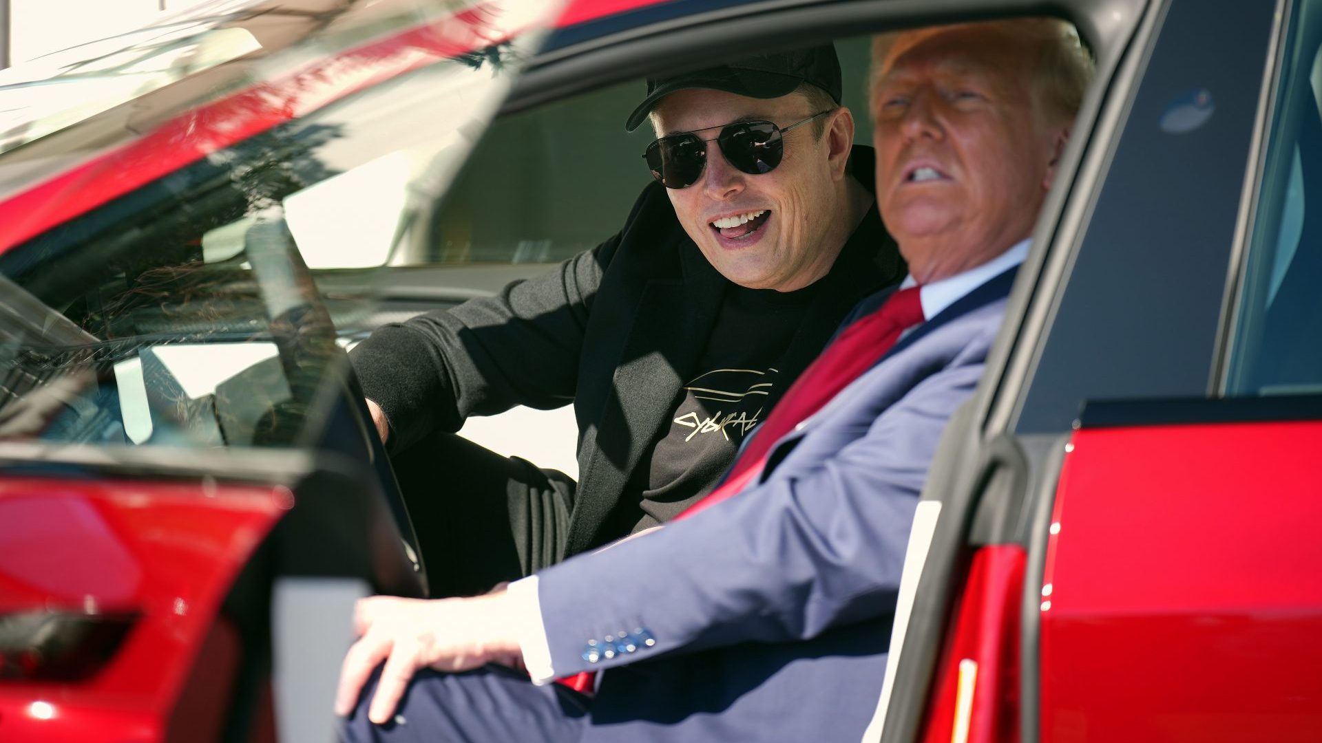 Donald Trump and Elon Musk sit in a Model S on the South Lawn of the White House. Photo: Andrew Harnik/Getty Images