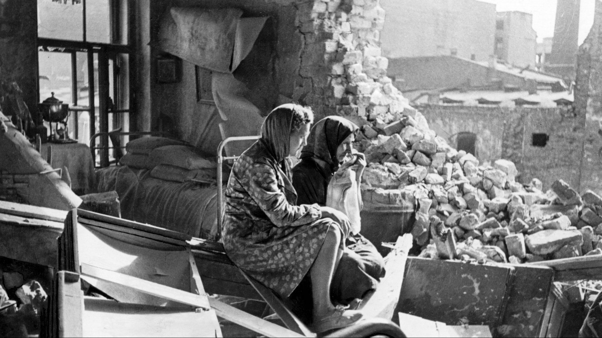 Two women sit among the debris of Leningrad (St Petersburg) in the aftermath of the German bombardment of the city, 1942. Photo: D Trakhtenberg/Slava Katamidze Collection/Getty